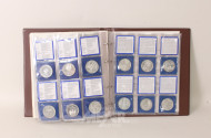 Münzalbum mit 80 Münzen