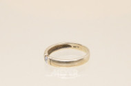 Ring, 585er GG, mit 1 kl. Diamanten,